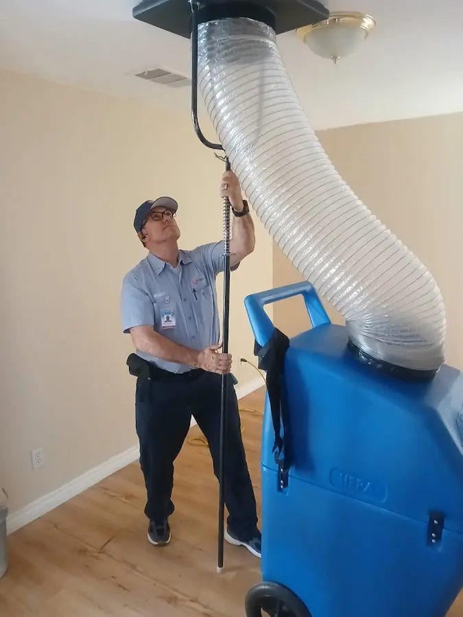 HVAC Installation technician using HEPA equipment in Moore